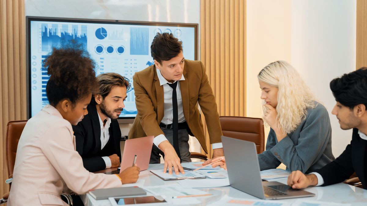 A team reviewing work together